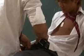 A sizzling Nipponese lad gets down and dirty in a hardcore romp, taking it up the rear and handling it like a pro. His moans echo as he's relentlessly pleasured, delivering an unforgettable gay anal spectacle.