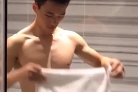Handsome fitness enthusiast indulges in a sensual self-care routine, washing his muscular body and tantalizing viewers with his masculine scent. This Taiwanese jock's self-pleasure journey showcases his bisexual prowess.