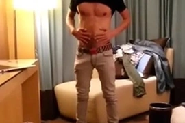 Young, handsome jock flaunts his impressive big black cock, teasing with his skills. An Asian stud joins in for a steamy handjob, culminating in a satisfying cumshot.