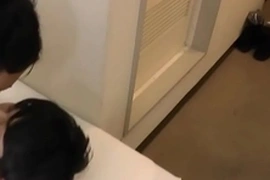Bound twink gets his ass rammed by a thick dong, while his own cock is stroked. HD video showcases intense bondage action with a skinny Asian boy.