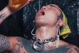 Yoshikawasaki, a hunky Asian jock with a tattooed body and a big cock, indulges in hardcore fetish play. He pisses into a glass, downs it, then jerks off, climaxing on camera.