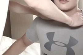 A young Asian boy can't resist pleasuring himself after a wild ride. He expertly strokes his thick cock, climaxing in a creamy explosion. This steamy gay Asian video is a sensual feast for viewers.