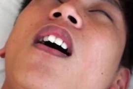 Asian medic engages in electrosex with a twink, using his toys to send waves of pleasure through the young man's body. This amateur video showcases a unique fetish encounter.
