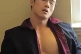 Sensual Asian beauty Punheta indulges in self-pleasure, skillfully caressing his tight, inviting body. His ecstatic moans echo through the room, intensifying the intimate experience. This video will leave you breathless.