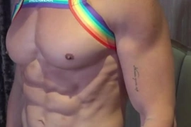 A stunning Asian hunk flaunts his sculpted abs, muscular back, and massive pecs, inviting adoration. His lean, chiseled physique embodies the perfect fusion of beauty and brawn, captivating viewers with his Asian muscle worship allure.