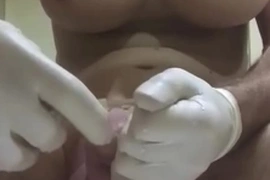 Huge butt plug with condom insertion into urethra